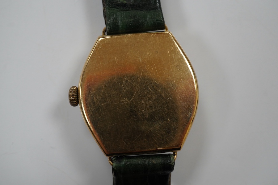 A gentleman's 1950's 9ct gold manual wind wrist watch, with Roman dial, signed Rolex movement, with Aaron Lufkin Dennison case, case diameter 29mm, on an associated leather strap. Condition - poor